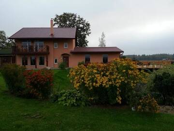 Фото номера Коттедж с 6 спальнями Дома для отпуска "Lībieši" г. Purmsāti 41