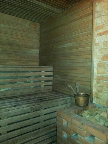 Фото номера Коттедж с 6 спальнями Дома для отпуска "Lībieši" г. Purmsāti 51
