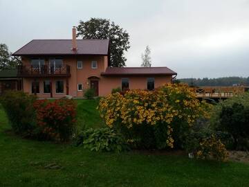 Фото номера Коттедж с 6 спальнями Дома для отпуска "Lībieši" г. Purmsāti 14